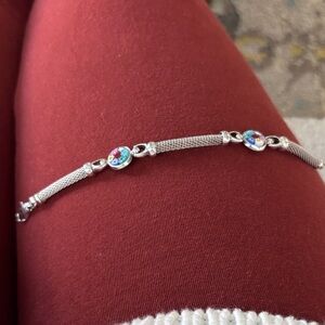 Sterling bracelet with glass settings